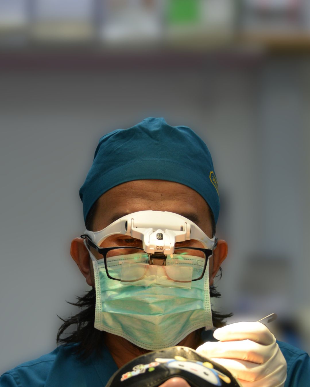 Dr. Ruz performing hair restoration procedures on patients from Malaysia and around the world